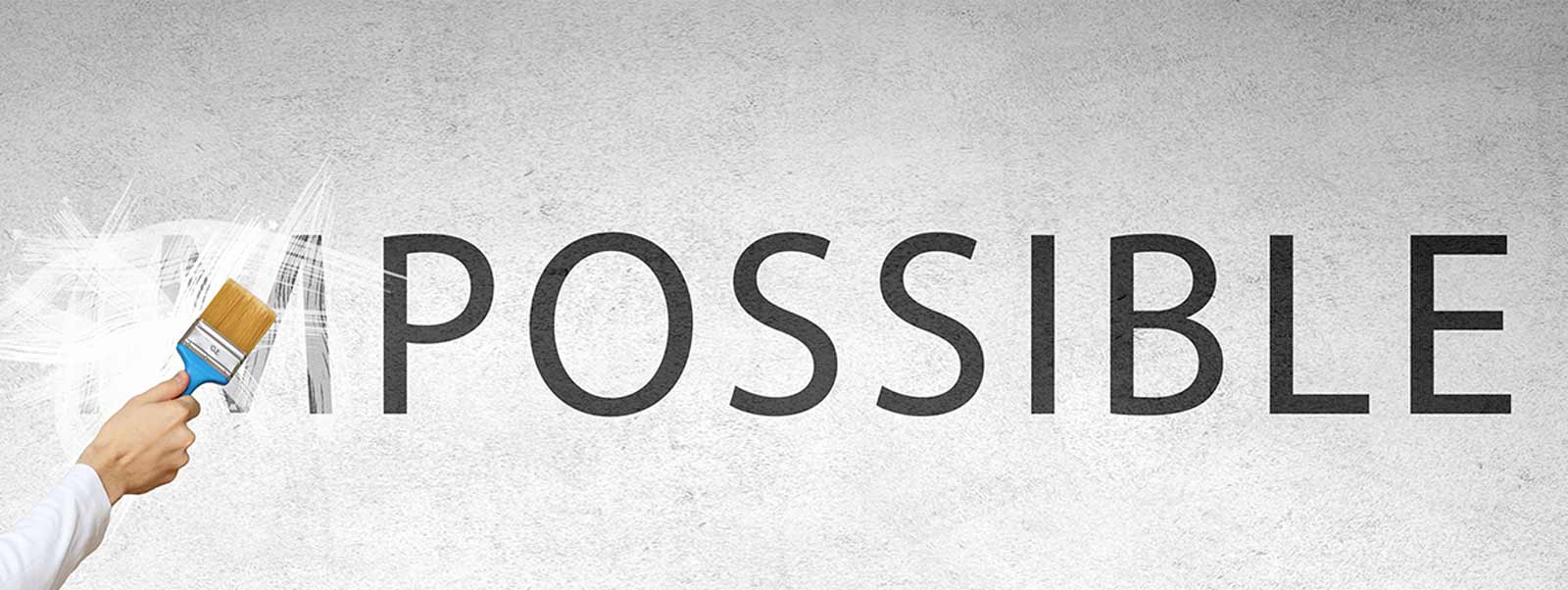Painting out "IM" in the word Impossible