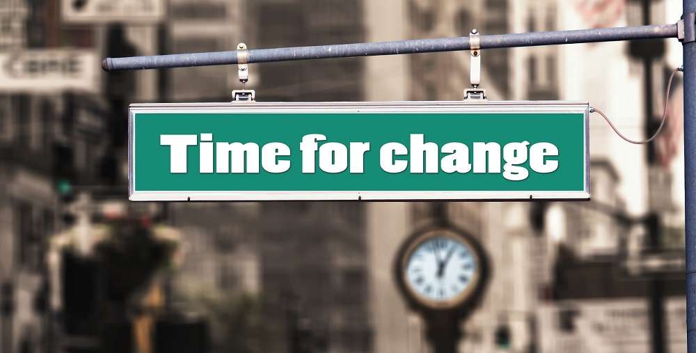 Time for Change sign on a roadside pole
