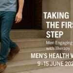 A man walking down some stairs taking the first step for men's health