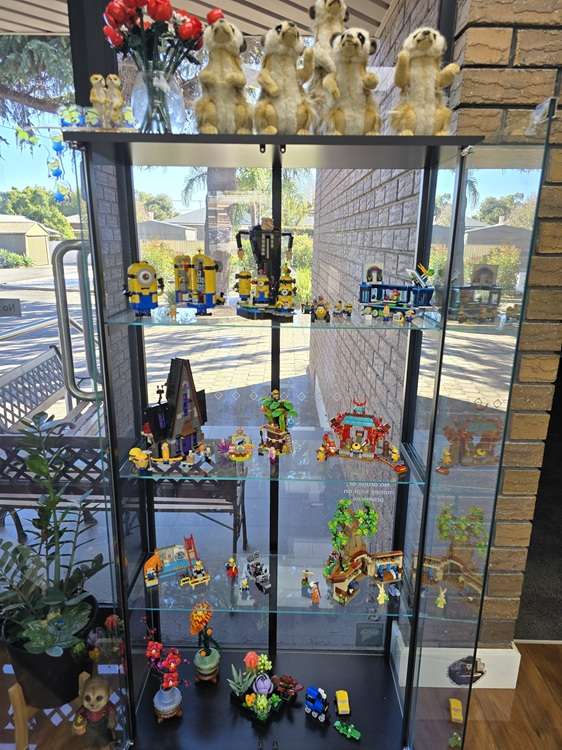 A cabinet at Paragon PsychConnect reception with many Lego pieces done by Angela