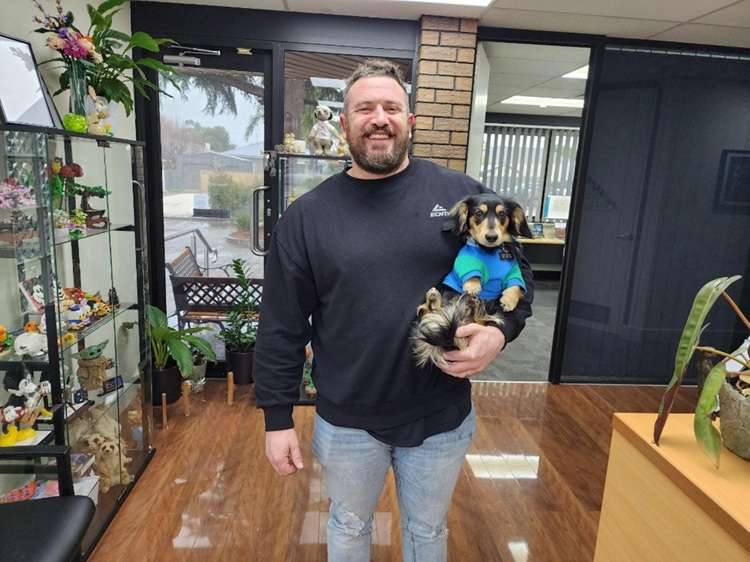 Simon and his dog Frankie in the Paragon PsychConnect reception area