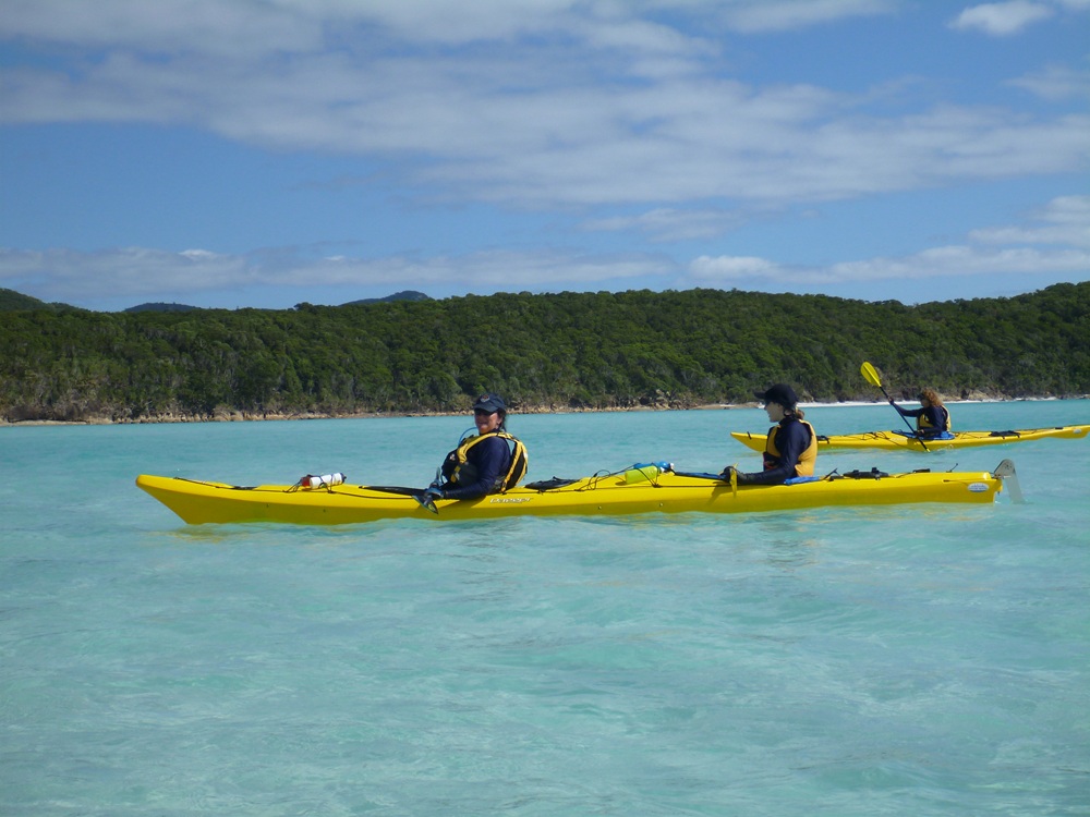 Maria and another person in a double yellow kayak in the Whitsundays