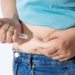 Injecting Obesity Medication - Paragon PsychConnect A woman injecting obesity medication into her stomach