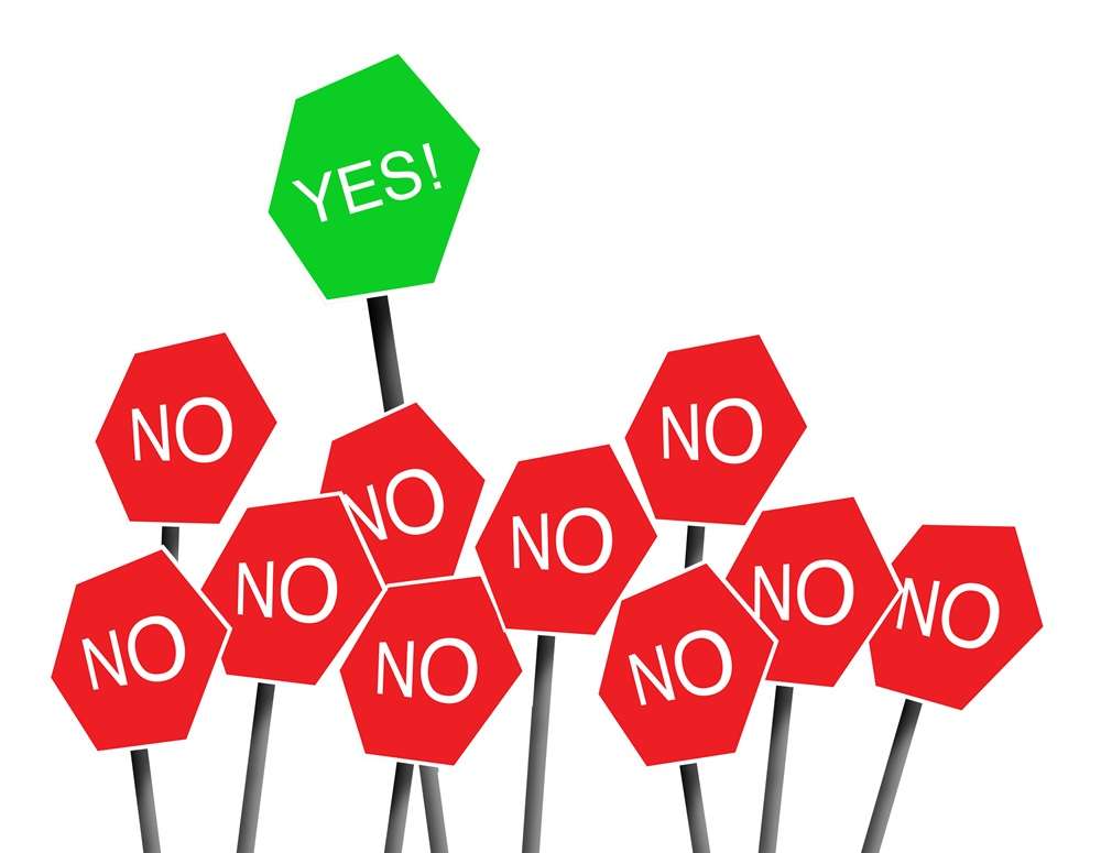 Overcoming the No - Paragon PsychConnect A green Yes sign and ten red No signs