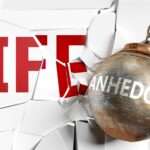 Anhedonia written on a wrecking ball smashing into a white background with the word Life on it